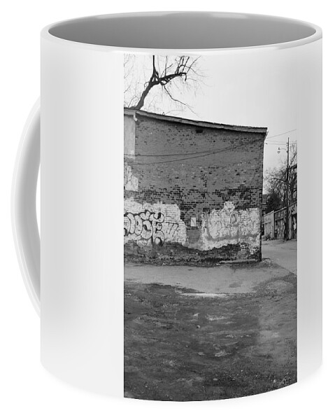  Coffee Mug featuring the photograph Fiend On The Roof by Kreddible Trout