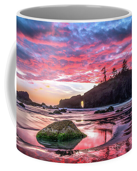 Sunset Coffee Mug featuring the photograph Fiery sky reflected in the water in OIympic National Park by Robert Miller