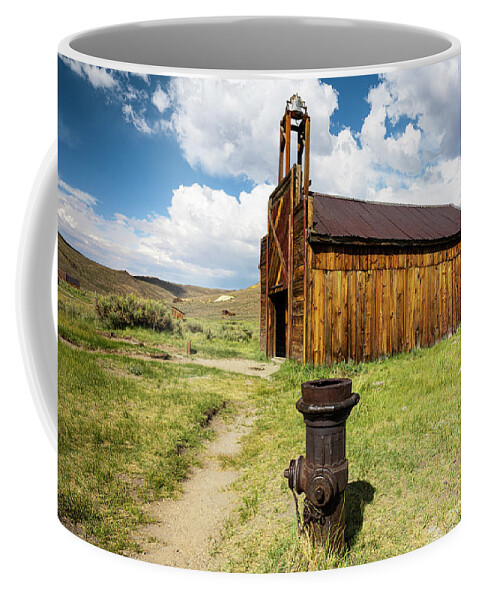 Bodie Coffee Mug featuring the photograph Fire Hydrant and Fire House in the Ghost Town of Bodie by Ron Long Ltd Photography