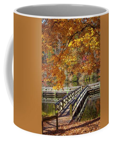 Carolina Coffee Mug featuring the photograph Fishing Dock under the Maple Trees by Debra and Dave Vanderlaan