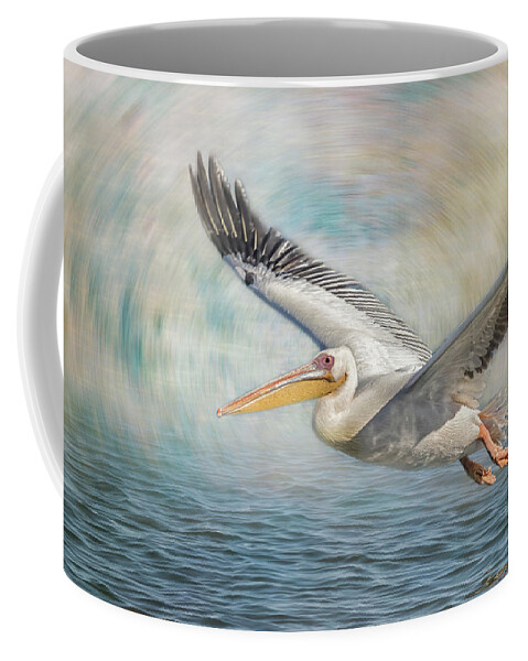 Great White Pelican Coffee Mug featuring the photograph Flight of a Great White Pelican by Belinda Greb