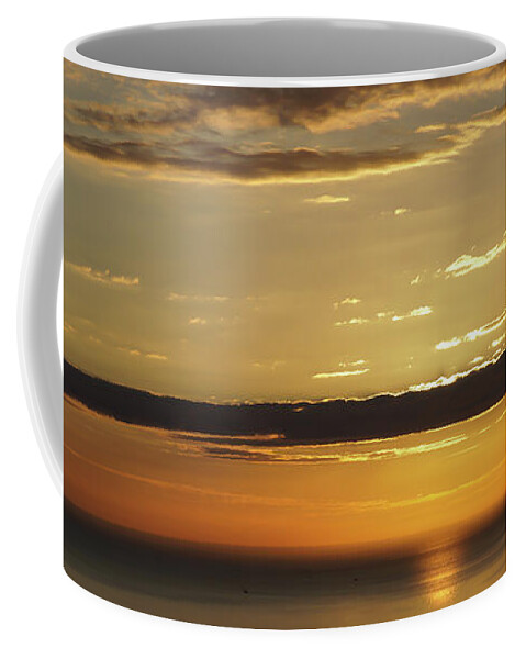Clouds Coffee Mug featuring the photograph Golden sunrise over the sea by Adriana Mueller
