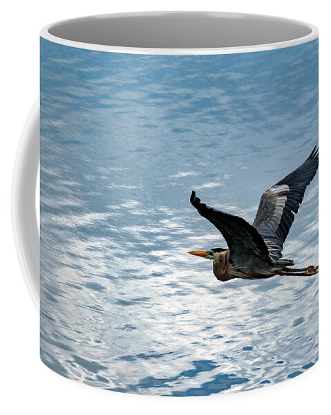 Great Coffee Mug featuring the photograph Great Blue Heron In Flight by Beachtown Views