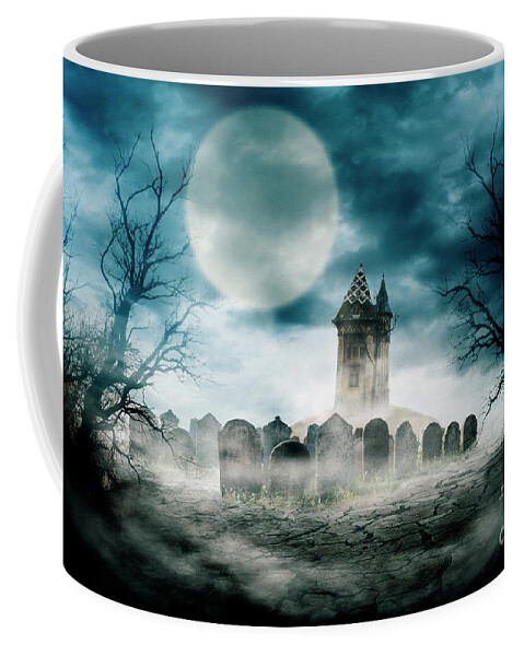 Halloween Coffee Mug featuring the photograph Halloween composition design with scary dark forest, haunted house and graveyard. by Jelena Jovanovic