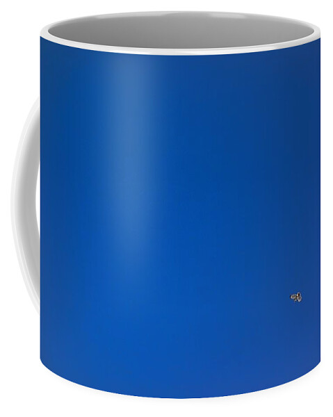 Hawk Coffee Mug featuring the photograph Hawk and Blue Sky by Russel Considine