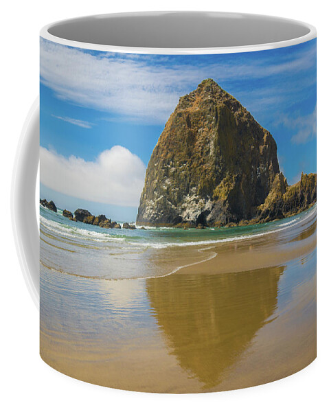 Beach Coffee Mug featuring the photograph Haystack Rock Reflection by Matthew DeGrushe