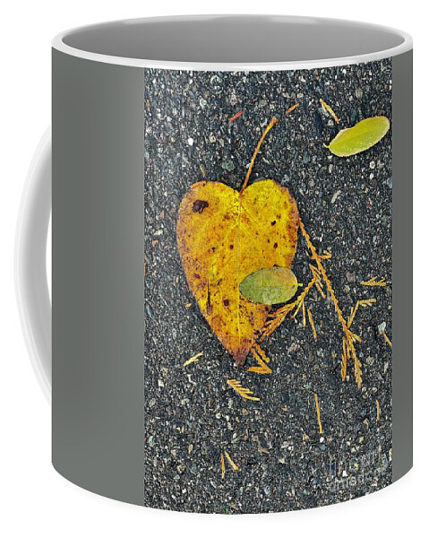 Leaf Coffee Mug featuring the photograph Heart Leaf by Suzanne Lorenz