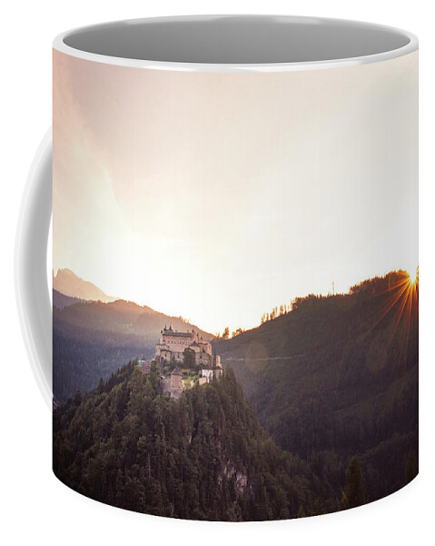 Reconstruction Coffee Mug featuring the photograph Hohenwerfen Castle at sunset by Vaclav Sonnek