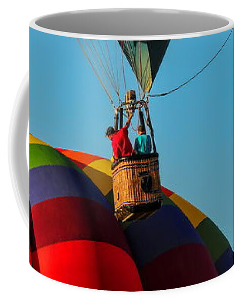 Wausau Coffee Mug featuring the photograph Hot Air Balloon Nudging Another Balloon by Dale Kauzlaric