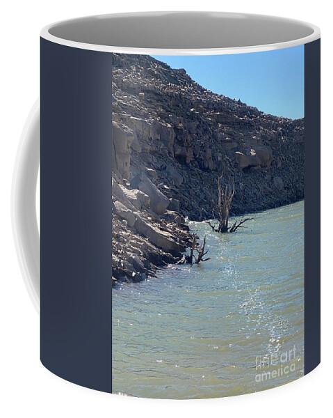 Flood Coffee Mug featuring the photograph Keeping your head above water by LeLa Becker