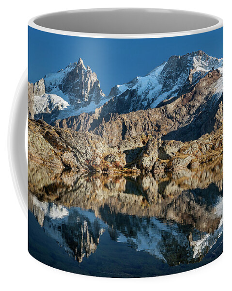 Lake Coffee Mug featuring the photograph La Meije peak mirrored in Lake Lerie by Olivier Parent