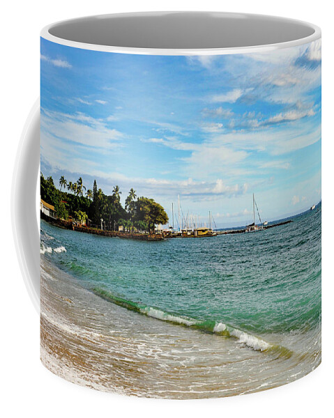 Maui Coffee Mug featuring the photograph Lahaina Yacht Harbor in the distance on the beach in front of the town of Lahaina, Maui, Hawaii. by Gunther Allen