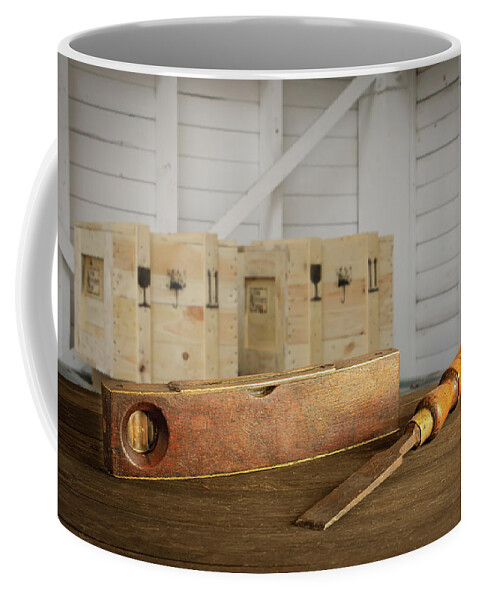 Spirit Level Coffee Mug featuring the photograph Levelling the cases by Average Images