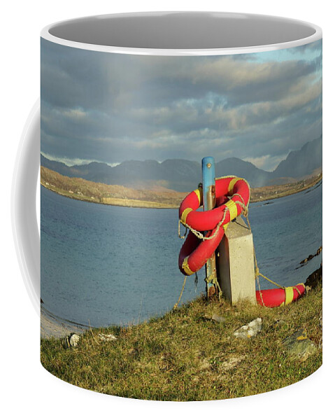Lifebuoy Connemara Ballyconneely Galway Ireland Saftey Outdoors Ocean Mountains Beach Walking Photography Coffee Mug featuring the photograph Life savers by Peter Skelton
