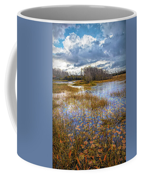 Marsh Coffee Mug featuring the photograph Lilypads in the Autumn Marsh Waters by Debra and Dave Vanderlaan