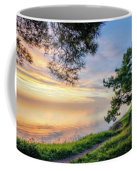 Sunset Coffee Mug featuring the photograph Little Path on a Hillside above the Sea at Sunset by Alexios Ntounas