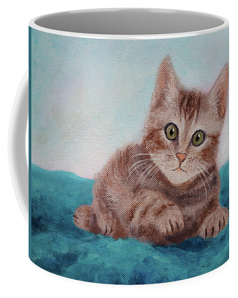 Cute Coffee Mug featuring the painting Little Tabby Cat Painting, a Cute Kitty Lying on a Blue Blanket by Aneta Soukalova