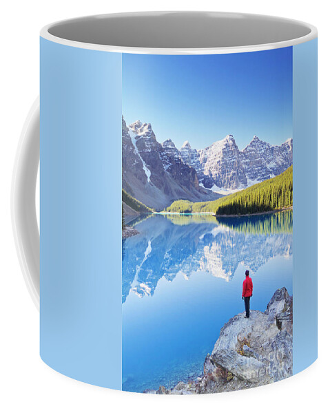 Moraine Lake Coffee Mug featuring the photograph Lone hiker at Moraine Lake, Canadian Rockies by Neale And Judith Clark