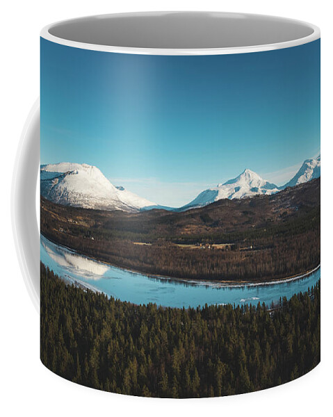 Touristic Coffee Mug featuring the photograph Malselva River with a reflection on the snow-covered hills by Vaclav Sonnek