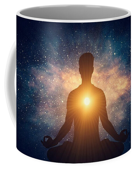 Yoga Coffee Mug featuring the photograph Man and soul. Yoga lotus pose meditation on nebula galaxy background by Michal Bednarek