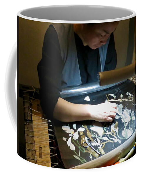 Embroidery Coffee Mug featuring the photograph Master at Work by Kerry Obrist