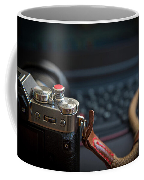 Buttons Coffee Mug featuring the photograph Mirrorless digital camera with control buttons , lens and strap by Michalakis Ppalis