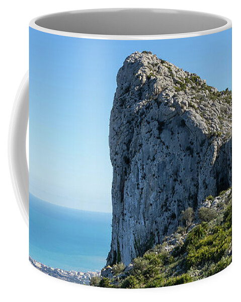 Mountain Coffee Mug featuring the photograph Morro de Segaria and the Mediterranean sea by Adriana Mueller