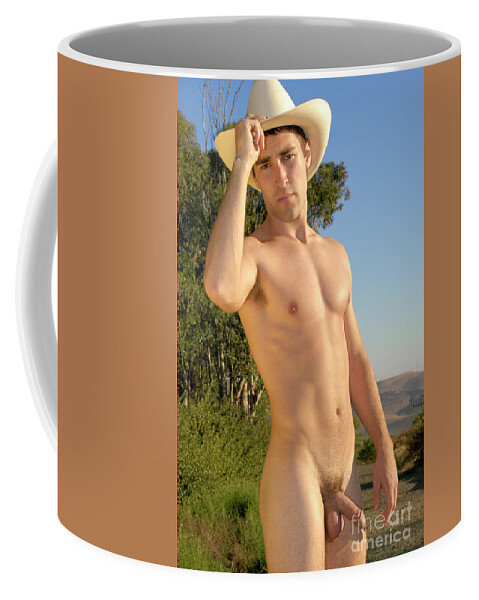 Male Art Coffee Mug featuring the photograph Naked Cowboy tips his hat howdy. by Gunther Allen