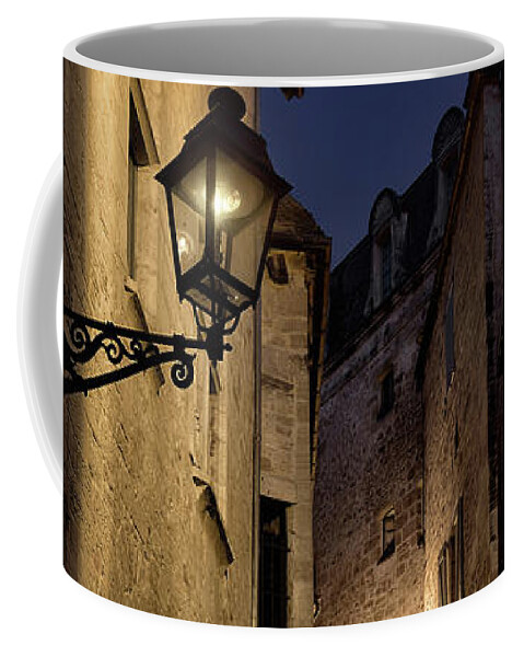 https://render.fineartamerica.com/images/rendered/default/frontright/mug/images/artworkimages/medium/3/narrow-dark-cobbled-street-with-stone-houses-with-street-lamps-a-maxim-images-prints.jpg?&targetx=2&targety=-162&imagewidth=800&imageheight=1069&modelwidth=800&modelheight=333&backgroundcolor=4C3825&orientation=0&producttype=coffeemug-11
