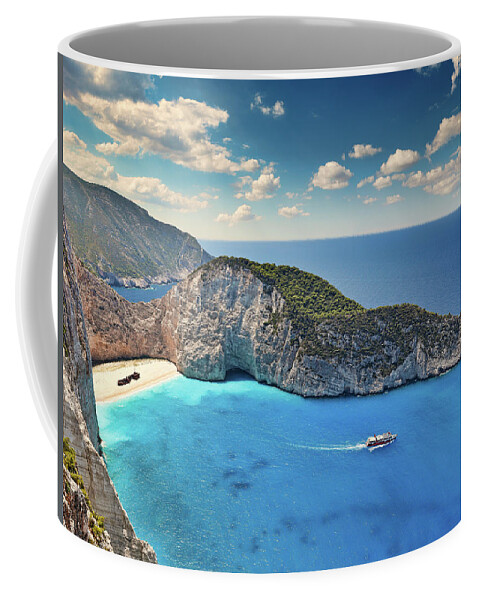 Bay Coffee Mug featuring the photograph Navagio in Zakynthos island, Greece by Constantinos Iliopoulos