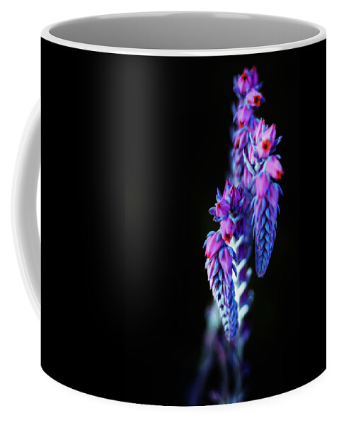 Blue Coffee Mug featuring the photograph Neon Bloom by Jason Roberts