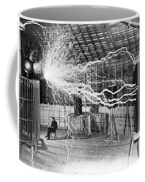 Nikola Tesla Coffee Mug featuring the photograph Nikola Tesla - Bolts Of Electricity by War Is Hell Store
