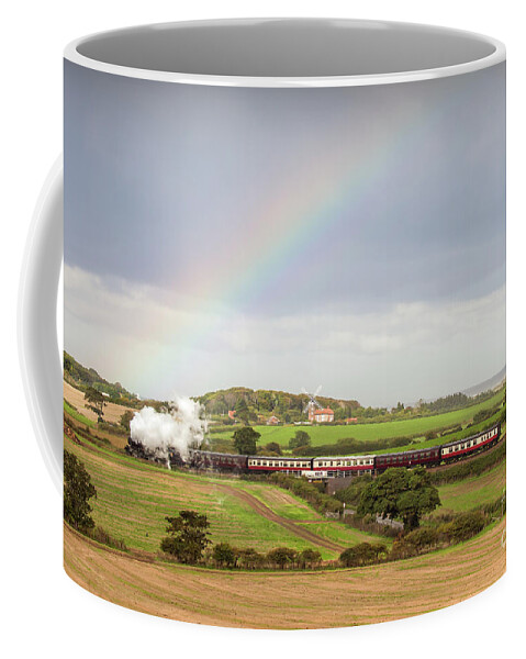 Weybourne Coffee Mug featuring the photograph Norfolk steam train with Weybourne windmill and rainbow by Simon Bratt