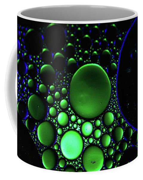 Light Coffee Mug featuring the photograph Oil and Water Abstract in Blue and Green by Amelia Pearn