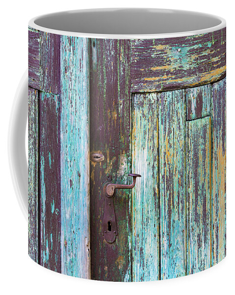 Wood Coffee Mug featuring the photograph Old door detail by Viktor Wallon-Hars