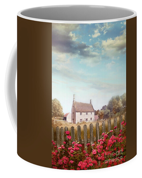 Blue Sky Coffee Mug featuring the digital art Old stone farmhouse with fence and roses by Sandra Cunningham