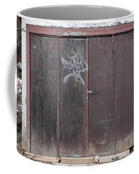 Urban Coffee Mug featuring the photograph Old Wine Door by Kreddible Trout