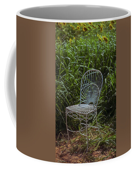 Chair Coffee Mug featuring the photograph Ornamental chair in a field of sunflowers by Alan Goldberg