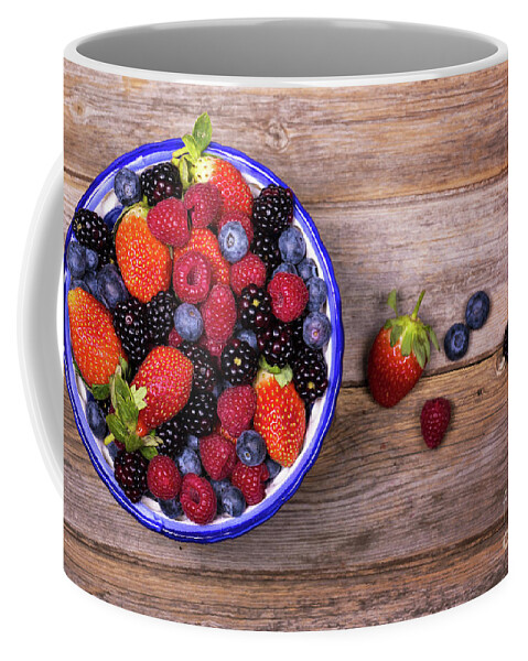 Background Coffee Mug featuring the photograph Overhead view of summer fruits in a bowl by Jane Rix