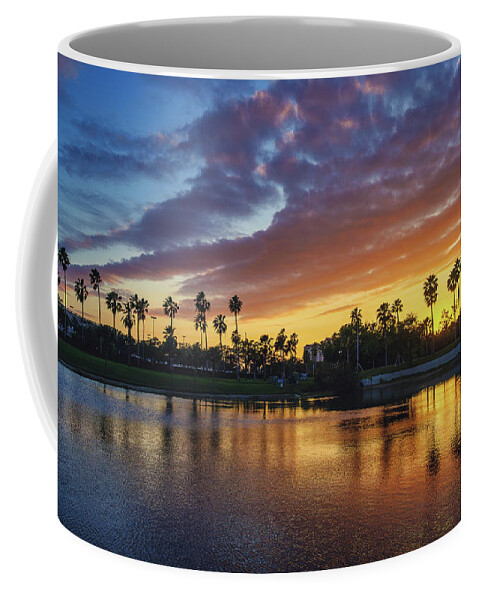 Coconut Trees Coffee Mug featuring the photograph Palm Beach Gardens Sunset at Gardens Parkway Lake by Kim Seng