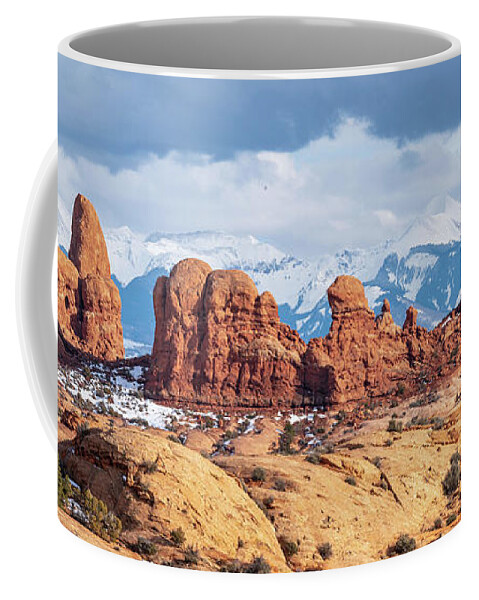 Panorama Coffee Mug featuring the photograph Panorama of rock formations in Arches National Park by Robert Miller