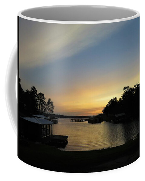 The Skies Are Mid-toned Blue And Yellow In This Beautiful Lake Sinclair (milledgeville Coffee Mug featuring the photograph Pastels Plenty Lake Sunrise by Ed Williams