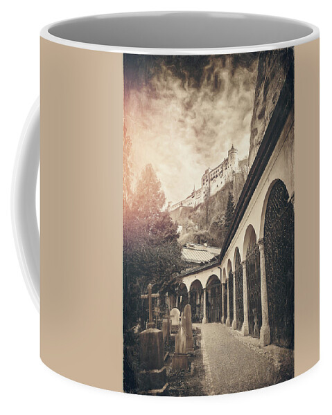 Salzburg Coffee Mug featuring the photograph Petersfriedhof and Salzburg Castle Vintage Sepia by Carol Japp