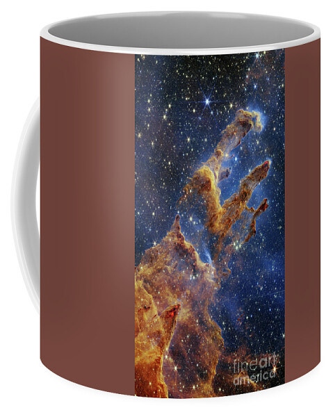 M16 Coffee Mug featuring the photograph Pillars of Creation, JWST image by Science Photo Library