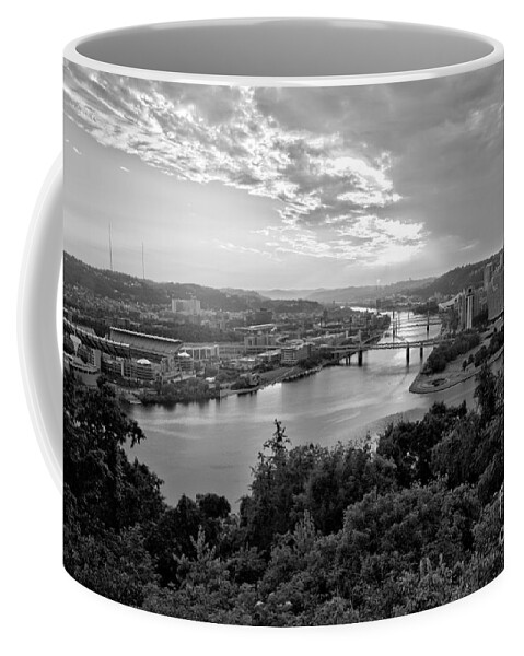 Pittsburgh Coffee Mug featuring the photograph Pittsburgh Fiery Skies Over The Allegheny River Black And White by Adam Jewell