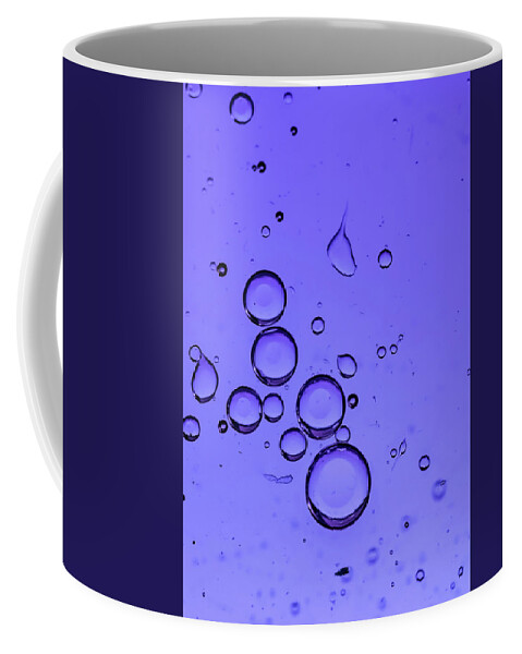 Abstract Coffee Mug featuring the photograph Purple Bubbles by Cathy Kovarik
