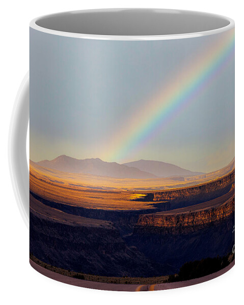 Taos Coffee Mug featuring the photograph Rainbow crossing the Rio Grande Gorge #1 by Elijah Rael