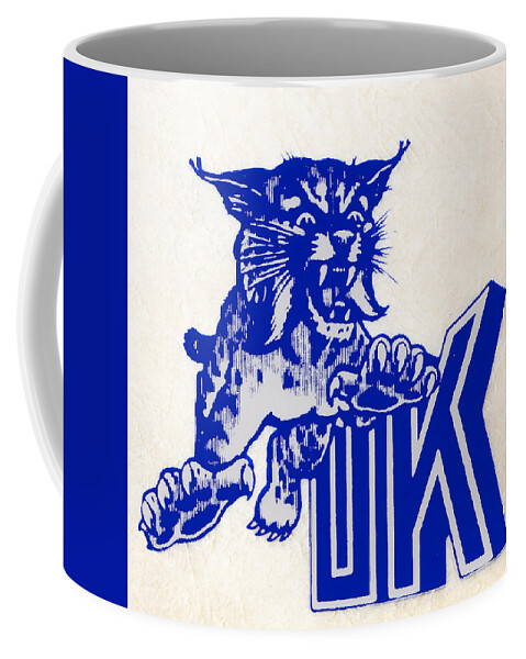 Uk Coffee Mug featuring the mixed media Retro UK Wildcat Art by Row One Brand