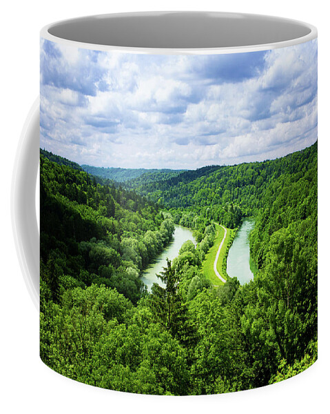 Two Coffee Mug featuring the photograph River and path in a valley. by Bernhard Schaffer