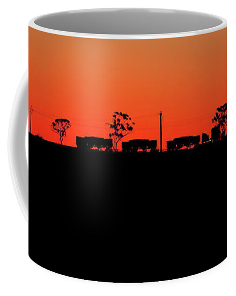 Outback South Australia Australia Sunset Roadtrain Road Train Silhouette Panorama Coffee Mug featuring the photograph Road Train Sunset Silhouette by Bill Robinson